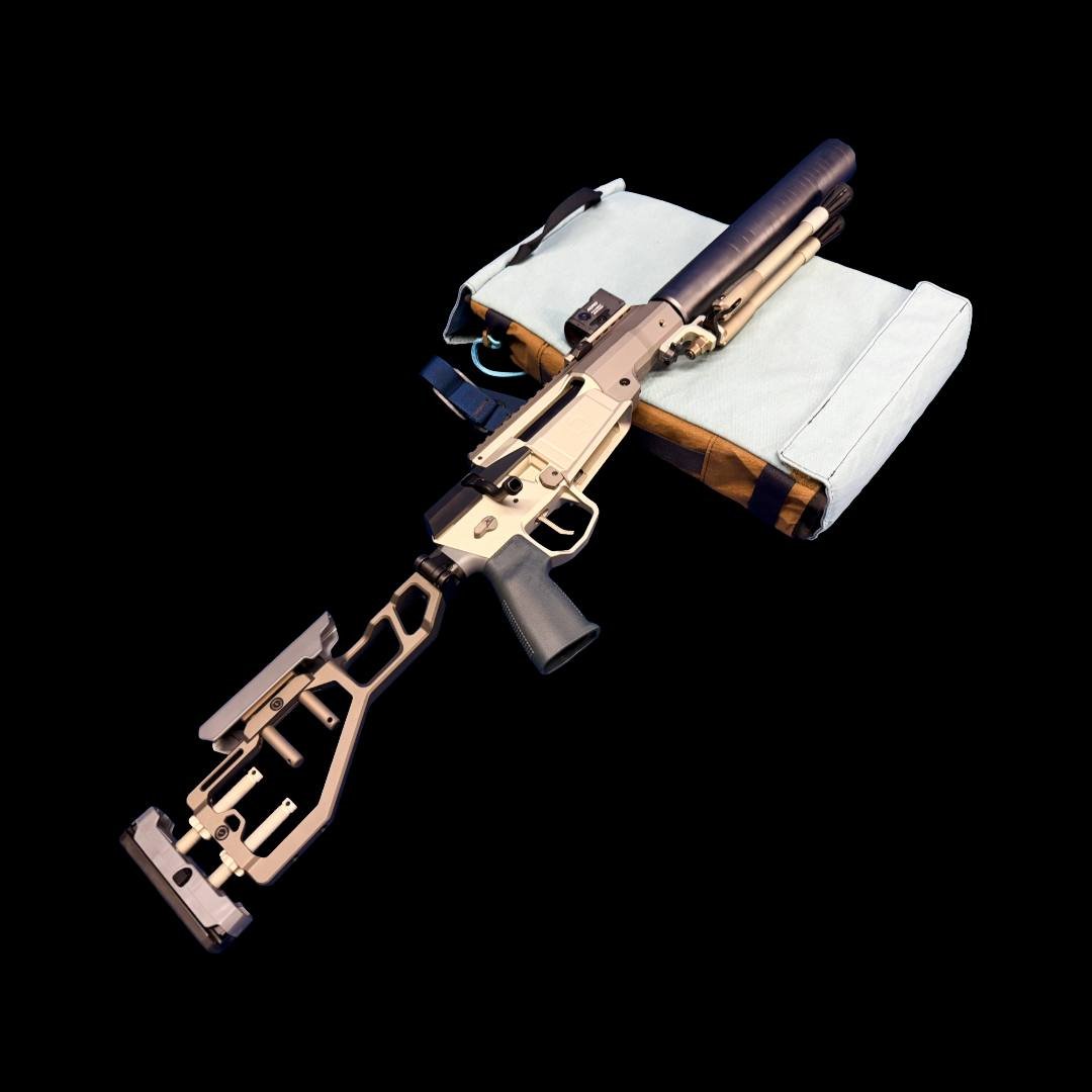 Tan precision rifle on a shooting rest at Academy Arms &amp; Optics